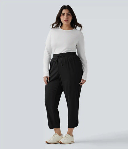 Plus Size Mid Rise Drawstring Curved Hem Quick Dry Golf Tapered Pants with Pockets-UPF40+