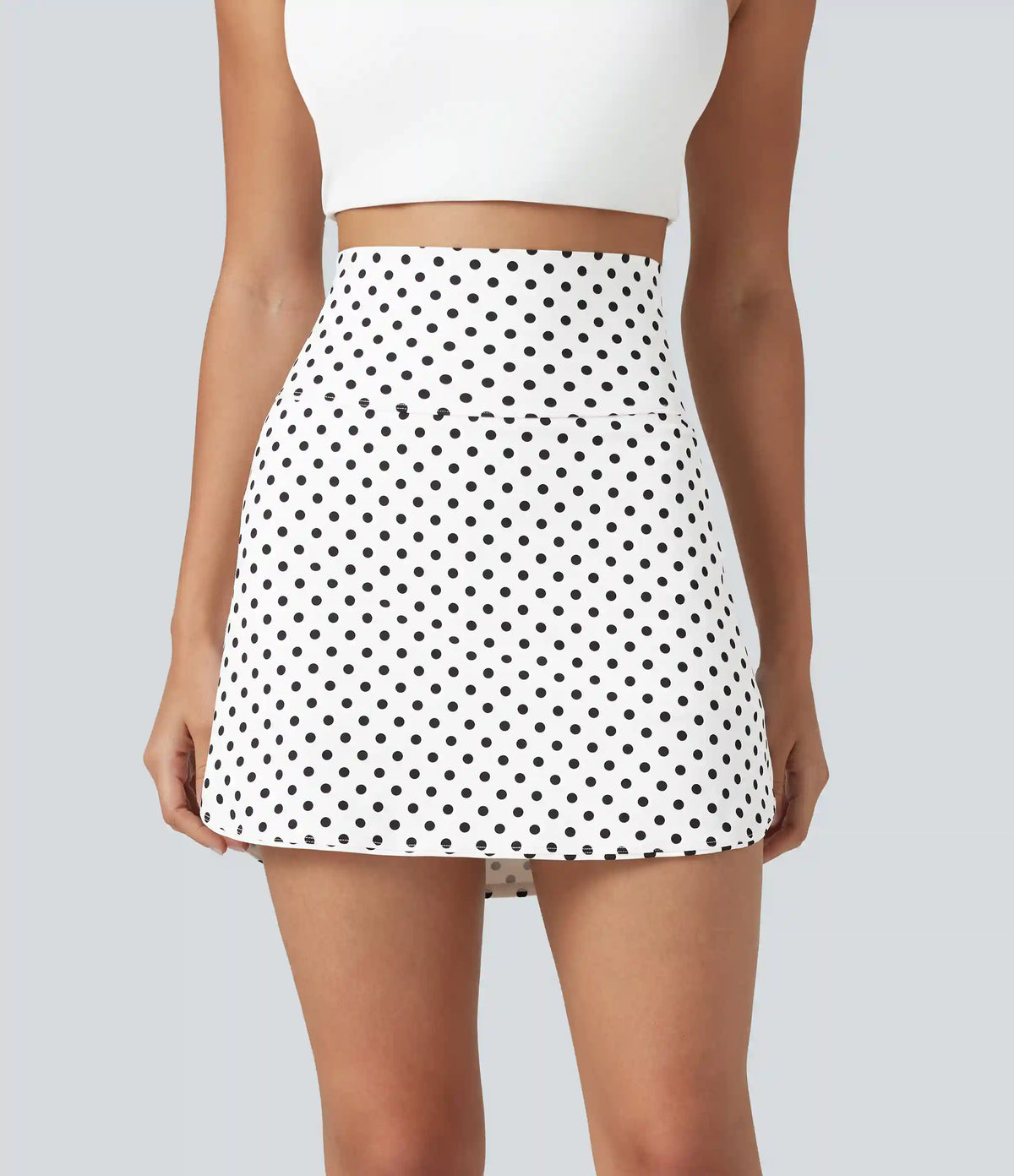 Ultra High-Waist Tummy Control Curved Hem 2-in-1 Polka Dot Golf Mini Skirt with Pockets