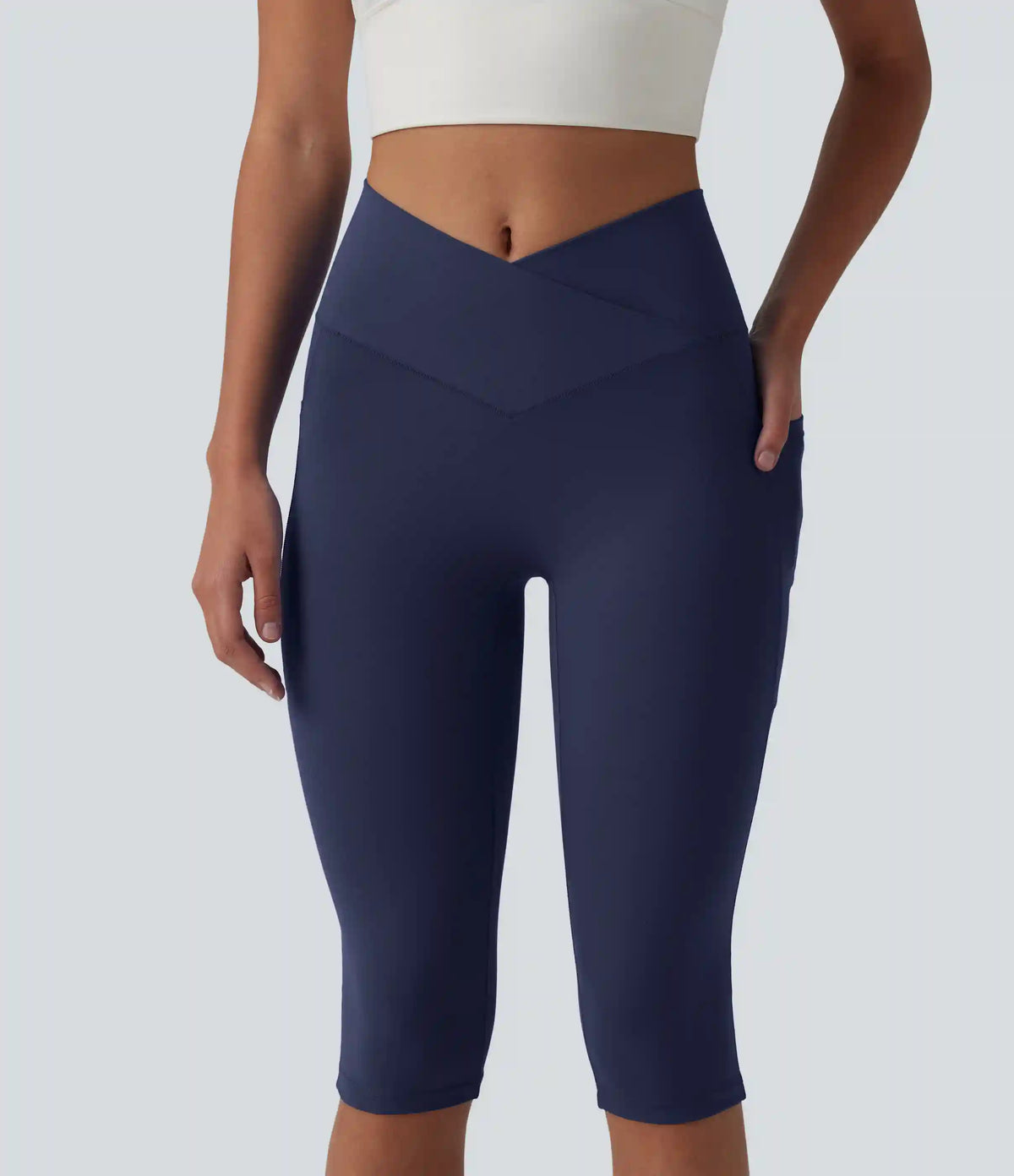 SoftlyZero™ High Waisted Crossover Pedal Pusher Yoga Leggings with Pockets